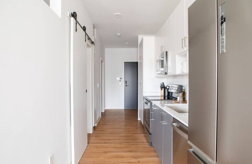 Yankee Hill Apartment | Chic East Side 1BR Apt with Balcony, Pool, and Gym