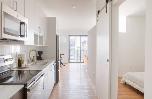 Yankee Hill Apartment | Chic East Side 1BR Apt with Balcony, Pool, and Gym