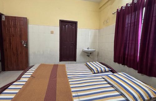 Kollur Hotel | Chinmayi Tourist Home - Opposite to temple only 50 m