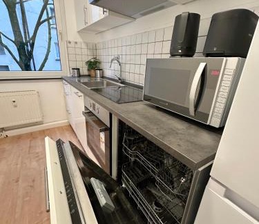 Sudostviertel Apartment | City Apartment with 2 individual beds and sleeping sofa and kitchen