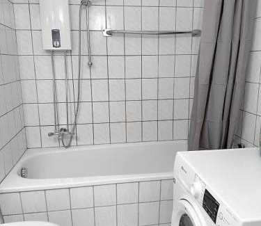 Sudostviertel Apartment | City Apartment with 2 individual beds and sleeping sofa and kitchen