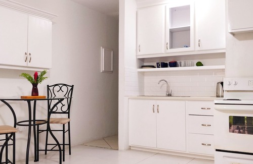 Diego Martin Condo | City Charm & Poolside Peace -Gated