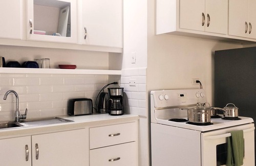 Diego Martin Condo | City Charm & Poolside Peace -Gated
