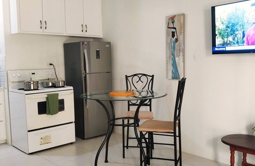 Diego Martin Condo | City Charm & Poolside Peace -Gated