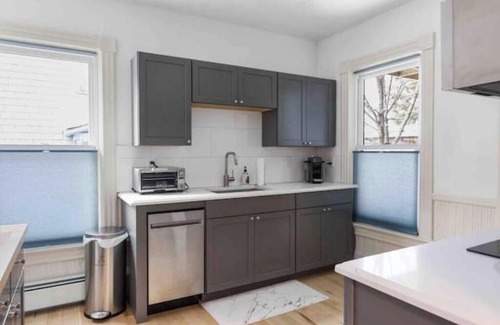 Old North End Apartment | Cityscape Sanctuary: parking+laundry