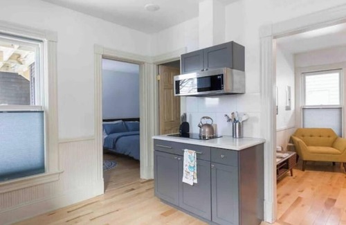 Old North End Apartment | Cityscape Sanctuary: parking+laundry