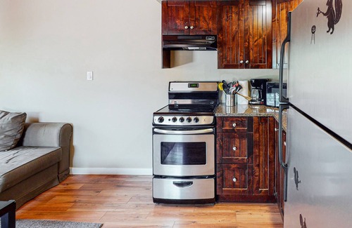 Lac Le Jeune Cabin | Classic log cabin with deck, full kitchen, & free internet