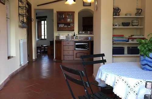 Mologno House | Classic Tuscan Home with Private Garden in the Old Walled City