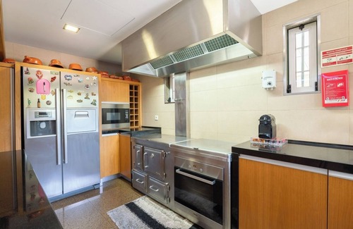 Paredes House | Classic Villa w/Gym and Pool Access by HostWise