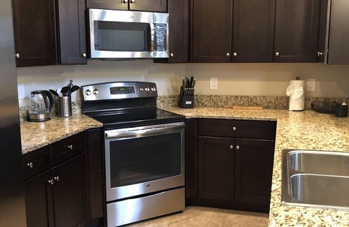 Biggar House | Clean luxury townhome in PASEO waterfront - living resort style!