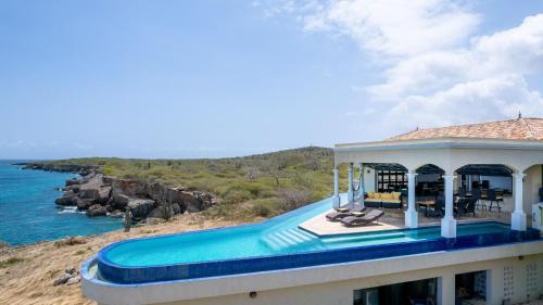 Sabana Westpunt Villa | Cliff Villa - Award Winning Luxury Retreat