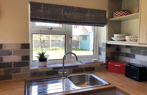Holt House | Close-by is a spacious pet friendly bungalow close to the Quay - a hidden gem