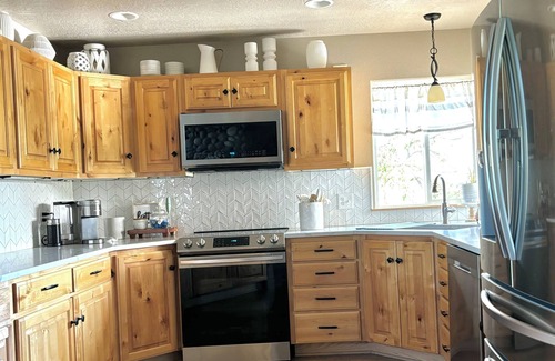 Athol House | Close to Silverwood Hot tub Game Room Fire Pit