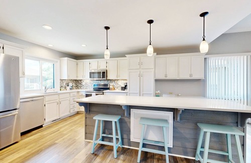 Summerwind Villas House | Coastal retreat with fireplace, AC, grill, lagoon views and close to beach