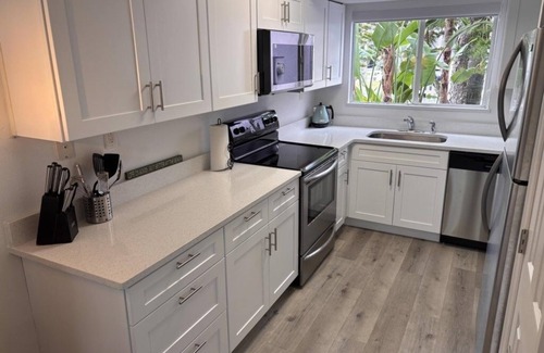New Smyrna Beach Condo | Coconut Palms Townhome 2 Bedroom Townhouse by RedAwning