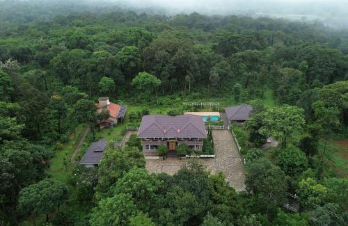 Virajpet Villa | Coffee & Mist Luxury Villa- Comp Breakfast, Pool, Lounge, and Coffee Estate by StayVista