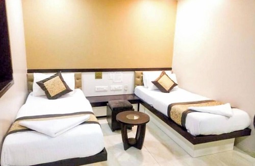 Wellington Pier Hotel | Colaba Suites - Near Taj Hotel