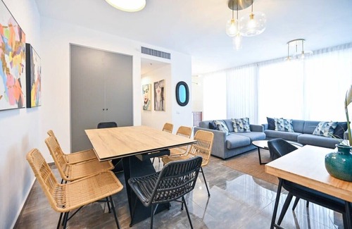 Tel Aviv Apartment | Colorful 2BR next to Gazoz Beach by HolyGuest