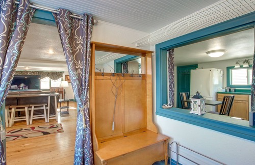 Campbellsport Cottage | Colorful Cottage w/Hot Tub - Steps to Long Lake!