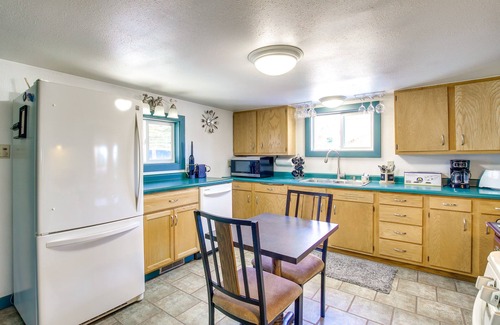 Campbellsport Cottage | Colorful Cottage w/Hot Tub - Steps to Long Lake!