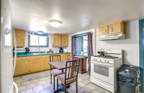 Campbellsport Cottage | Colorful Cottage w/Hot Tub - Steps to Long Lake!