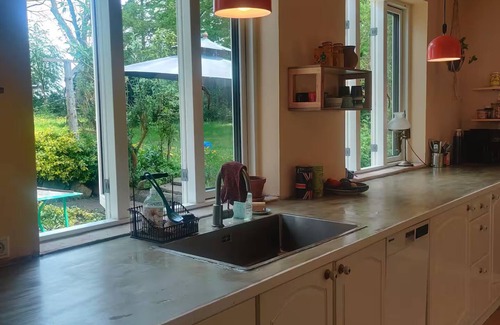 Hesselager House | Colorful home on a natural plot with its own small forest