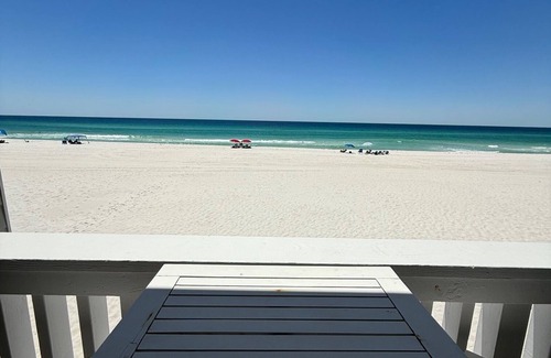 Sunnyside House | Come put your toes in the sand. This house is directly on the beach!