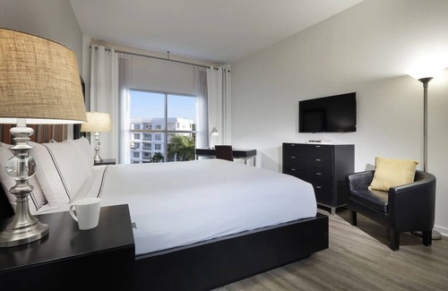 Celebration House | Comfort Melia Room in Celebration, Spanish-Style Resort Near Disney