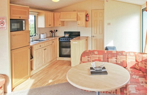 Narberth House | Comfortable and spacious 12ft-wide caravan with one double and two twin.