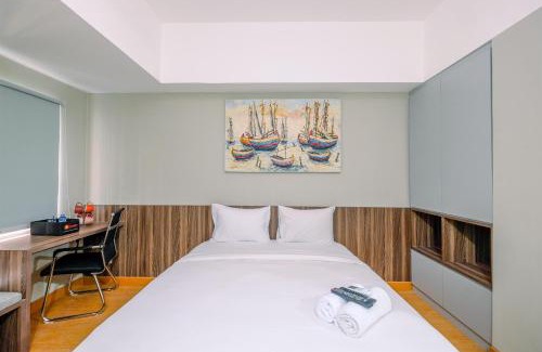 Duren Sawit Apartment | Comfortable Pool View Studio Room at Gateway Park LRT City Jatibening Apartment By Travelio