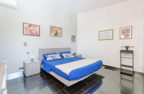 San Faustino-Madonnina-Quattroville Apartment | Comics & Cars - Themed Penthouse in Motor Valley