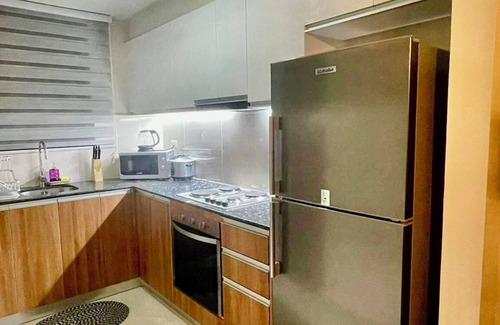 Lapu-Lapu Condo | Condo by the Beach OMP Mactan International Airport Cebu 3-bedroom/3 bathrooms