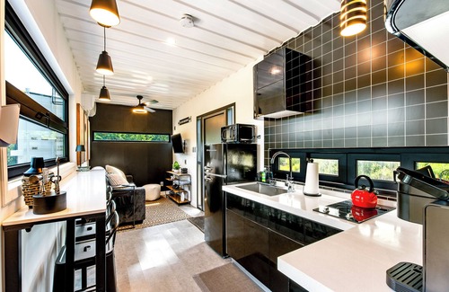 Littleton House | Container Home with Mountain Views Deck Fire Pit