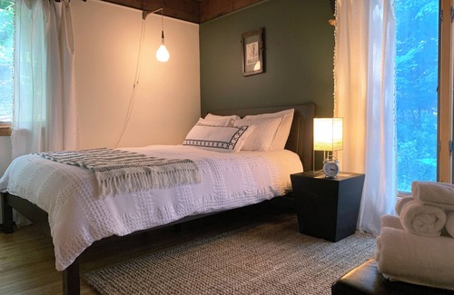 Ithaca Cabin | Contemporary lodge tucked in serene woods, yet minutes to Cornell, IC & downtown
