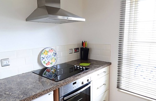 Pagham Apartment | Contemporary & sleek self-catering space, with secure off-street parking.