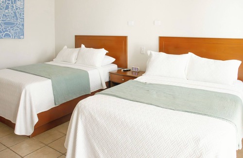 Benito Juarez Hotel | Costa Elegante Hotel & Suites