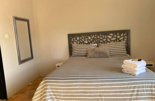 Harare East House | Cosy 2-Bedroom Retreat with Garden, Hot Water & Solar Backup