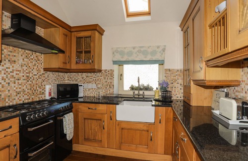 Llangaffo Cottage | COSY BARN, family friendly, with open fire in Llangaffo