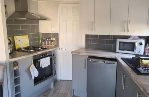 Llanrhystud House | Cosy caravan on championship golf course, ideal for a relaxing break