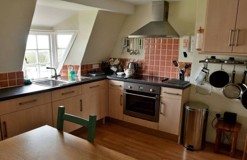 West Bay Apartment | Cosy character apartment overlooking historic harbour and beach