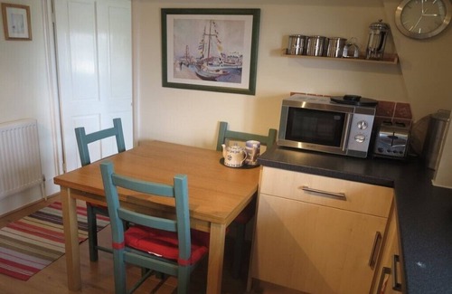 West Bay Apartment | Cosy character apartment overlooking historic harbour and beach