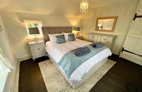 Layer Marney House | Cosy Coastal 2-Bedroom Cottage with Hot Tub and Log Burner