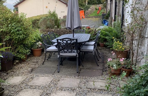 Lindale Cottage | Cosy Lakeland Cottage with jacuzzi bath, log fires and a 4 poster bed.