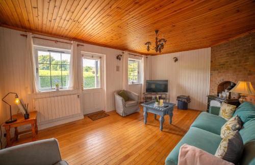 Bailieborough Ski Chalet | Cosy Lakeside Chalet With Option to add Private Hot Tub