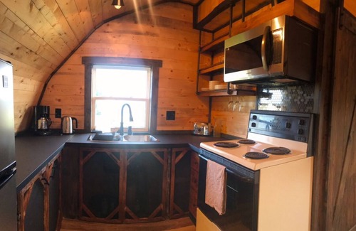 Tignish House | Cosy loft escape. A sandy beach across the street with ocean views.nPet friendly