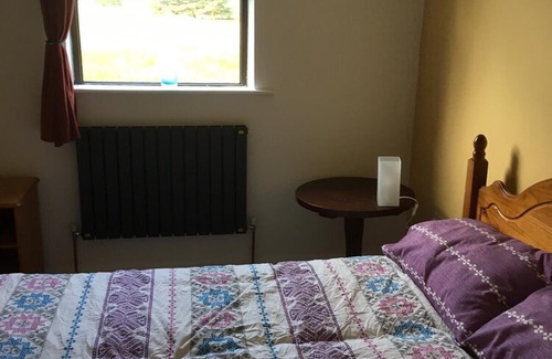 Inishmacatreer Cottage | Cosy remote mountain cottage and barn surrounded by lakes, forest and coast