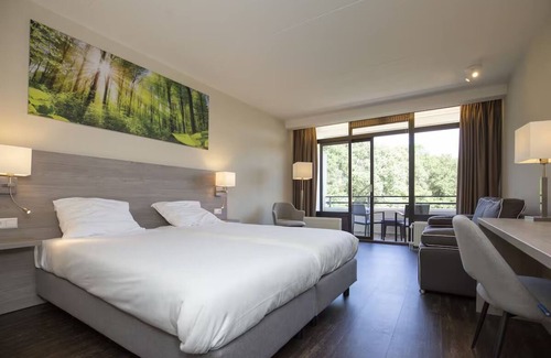 Winterswijk Hotel | Country Comfort with Heated Indoor Pool, Game Room and Free On-Site Parking