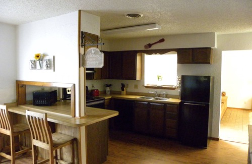Hobbs House | Country Haven has 3 bedrooms and 2 baths. A kitchen, living room and dining.