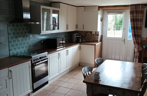Meneac House | Countryside cottage with Nordic wood fired spa & above ground swimming pool