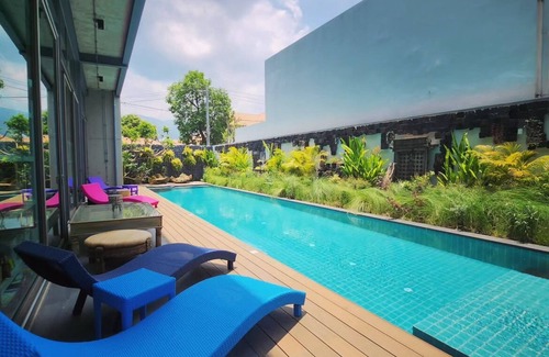 Huay Kaew Villa | Cozy loft-style rooms, private baths, free Wi-Fi, A/C, and shared spaces.